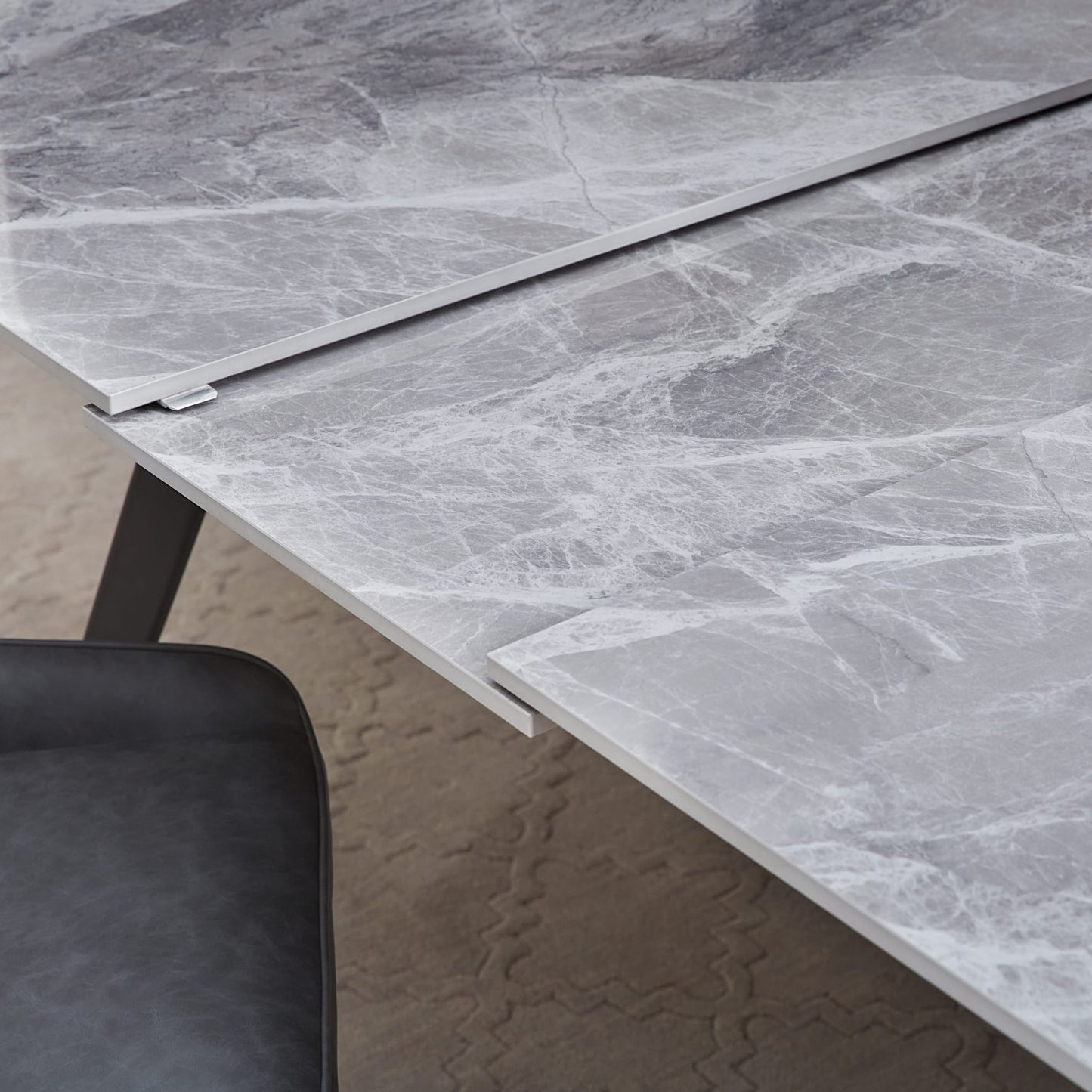 Modus Lucia Extendable Stone Top Metal Leg Dining Table in Piedra and Black