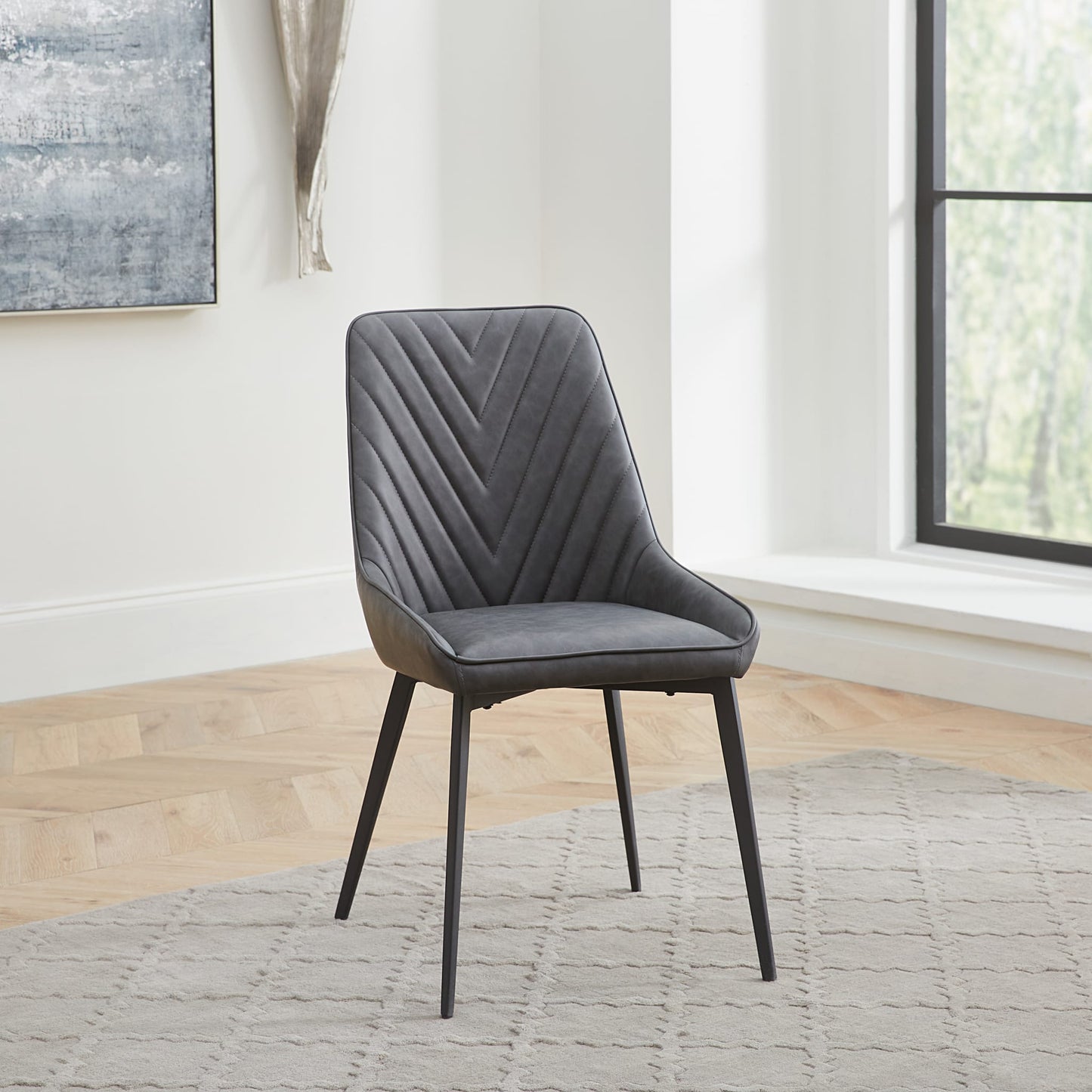 Modus Lucia Upholstered Dining Chair in Charcoal Synthetic Leather and Black Metal